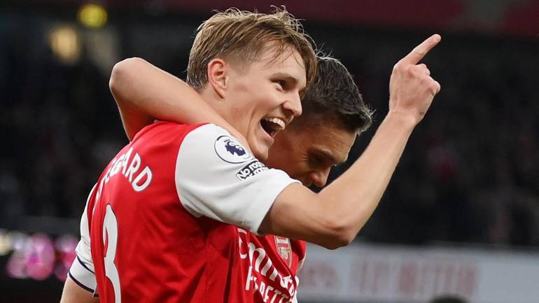 Odegaard double lifts Arsenal past Chelsea and back to top of table