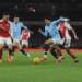 Nathaniel Bassey reacts to Arsenal’s victory over Manchester City